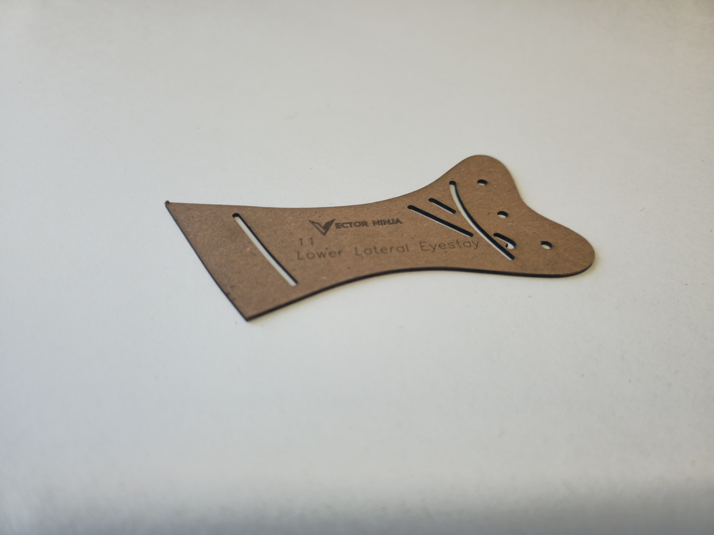 Slanted VectorNinja lower eyestay template showing the 1.3mm chipboard edge